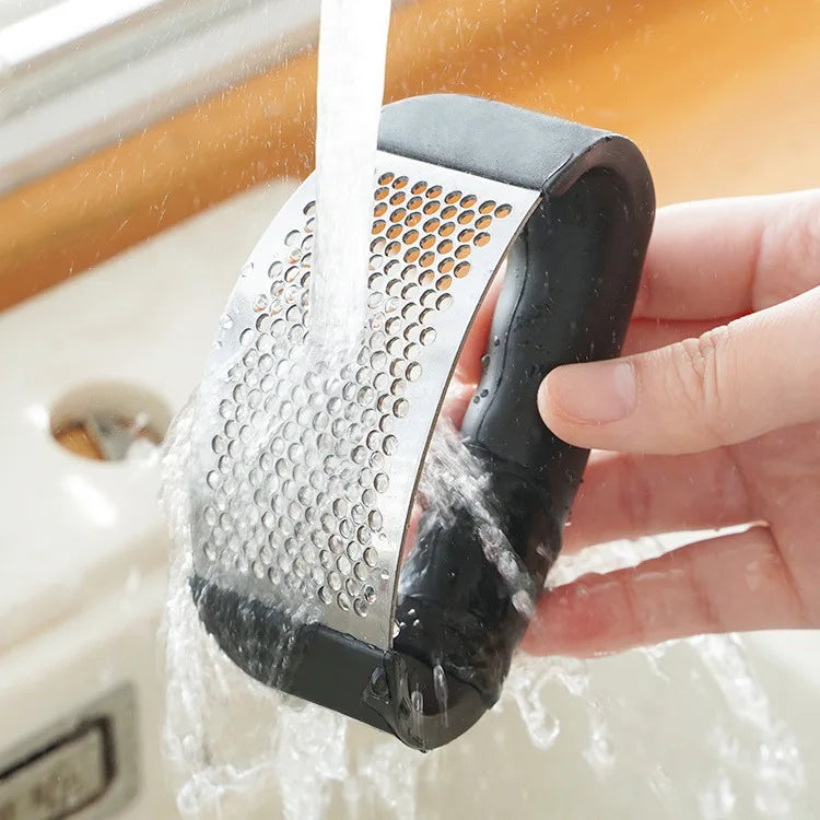 Espremedor de alho em aço inoxidável